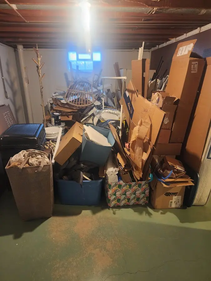 Roll-off dumpster container at job site for 15 Yard Dumpster Rental in Day Valley